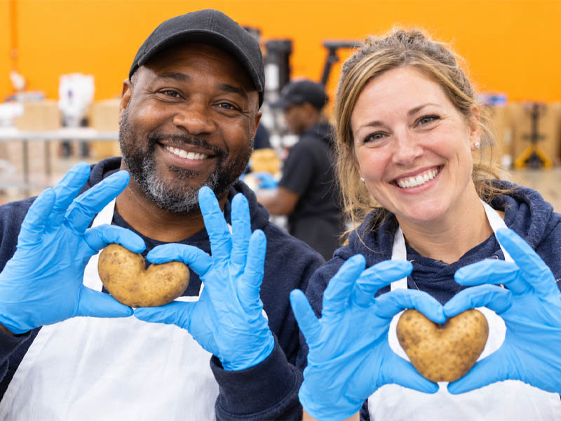 Community members joining together to serve their neighbors